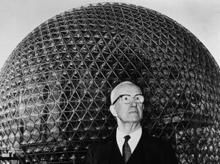 Buckminster Fuller in front of a geodesic dome